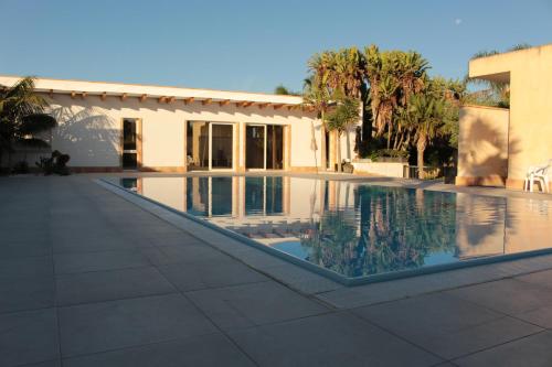 Bazén v ubytování Villetta di Nonna Giovanna nebo v jeho okolí