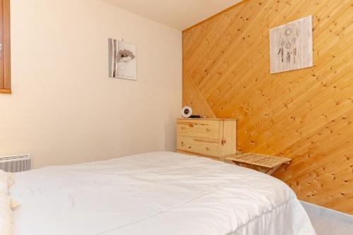 Ένα ή περισσότερα κρεβάτια σε δωμάτιο στο Appartement plein ciel 4-6 pers