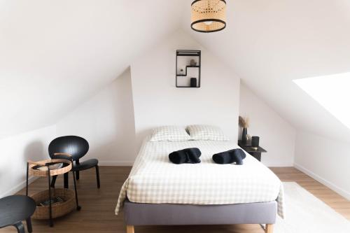 Ένα ή περισσότερα κρεβάτια σε δωμάτιο στο Appartement confort à Rouen