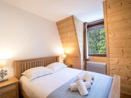 Postel nebo postele na pokoji v ubytování Grand appart au centre de Chamonix avec Wifi et garage, proche des pistes - FR-1-343-229