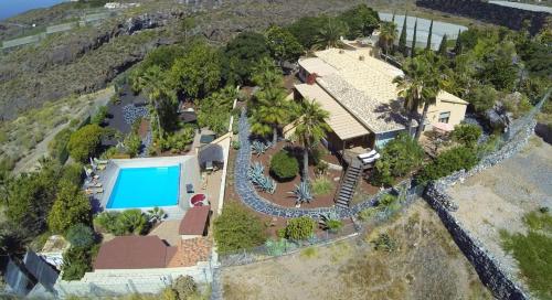 an aerial view of a house with a swimming pool at Casa Robinson in Guía de Isora