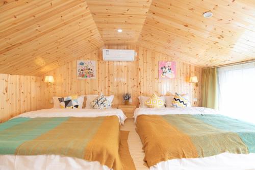 Voodi või voodid majutusasutuse 上海落云间酒店 toas