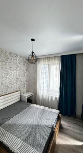 Postel nebo postele na pokoji v ubytování Sky Residences Condo