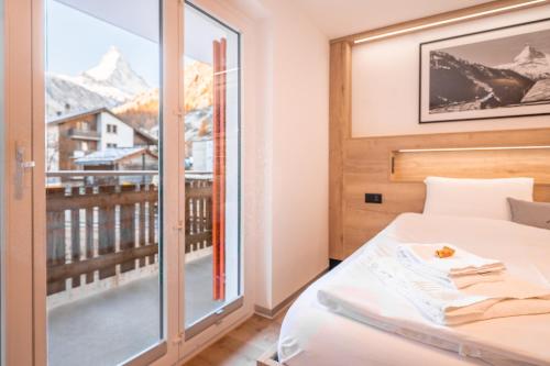 Studio Enzian - Matterhorn Sicht bei der Bergbahn Inspiringplaceszermatt