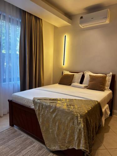 Ένα ή περισσότερα κρεβάτια σε δωμάτιο στο Marula Stays