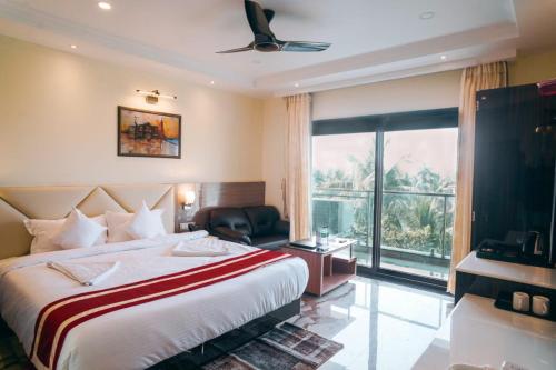 Ένα ή περισσότερα κρεβάτια σε δωμάτιο στο Resort K Sea View Mandarmoni