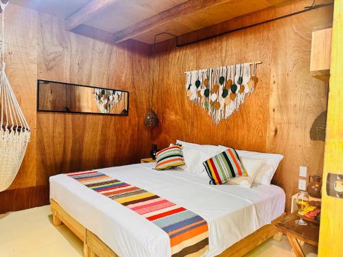 Ένα ή περισσότερα κρεβάτια σε δωμάτιο στο Cabañas Costa Madêro