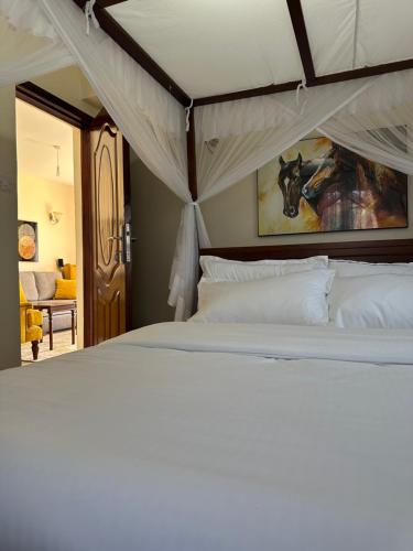 Ένα ή περισσότερα κρεβάτια σε δωμάτιο στο Lakeview Apartments - Serene Mustard