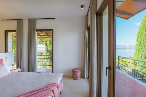 Postel nebo postele na pokoji v ubytování CASA DEI FIAMMINGHI 10&2, Emma Villas