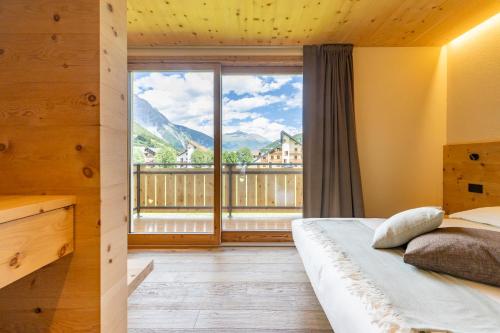 Ένα ή περισσότερα κρεβάτια σε δωμάτιο στο Mot chalet