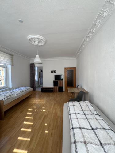 Postel nebo postele na pokoji v ubytování Monteurwohnung nähe Südbahnhof