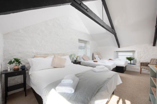 Voodi või voodid majutusasutuse Cape Cornwall Club toas