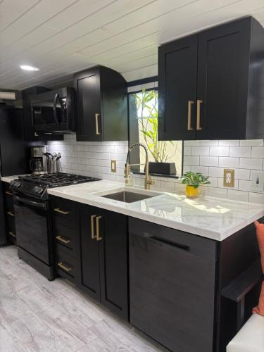 Gallery image of Sleek, Modern, Pet Friendly Custom Tour Bus! in Clermont