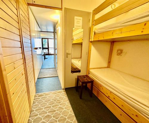 Кровать или кровати в номере L'Etoile d'Arc 2000 - Ménage inclus - Arc 2000 - Ski IN-OUT - La Conciergerie du Varet