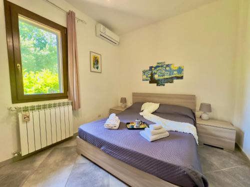 Voodi või voodid majutusasutuse Rifugio Toscano per 4 con giardino privato e BBQ toas