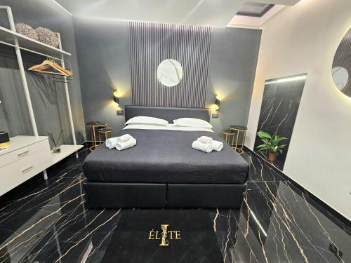 Giường trong phòng chung tại Elite holiday apartments Catanzaro