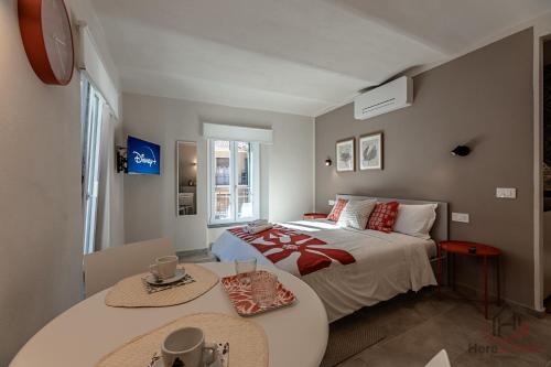 Ένα ή περισσότερα κρεβάτια σε δωμάτιο στο Alta Via 1 - Free Parking - Sea 20 min - A-C