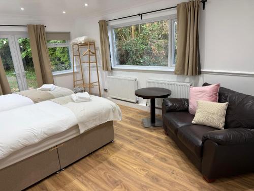 Ένα ή περισσότερα κρεβάτια σε δωμάτιο στο Stansted Stop Over