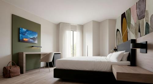 Кровать или кровати в номере Hotel Universal