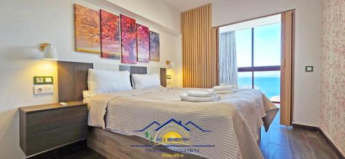 Postel nebo postele na pokoji v ubytování Claudia Monte Carlo