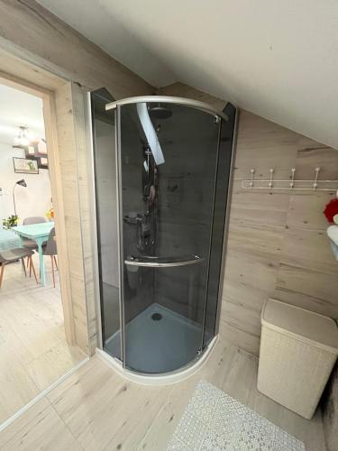 a shower in the corner of a room at Melody in Kapela