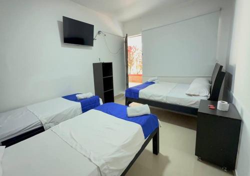 Ένα ή περισσότερα κρεβάτια σε δωμάτιο στο Quinta de san pedro