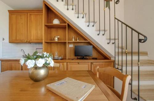 Μια τηλεόραση ή/και κέντρο ψυχαγωγίας στο Dimora Le Galere - Pool & Relax