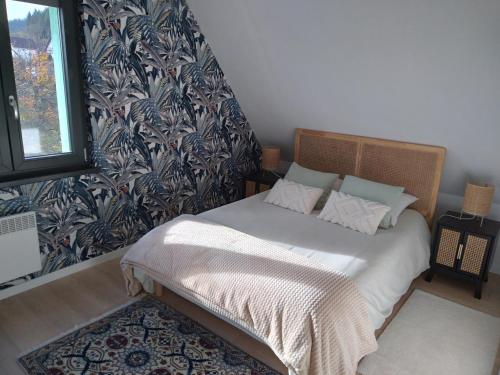 Postel nebo postele na pokoji v ubytování Le repos du facteur