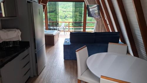 Η κουζίνα ή μικρή κουζίνα στο Chalé Rosa Linder - Alfredo Wagner-SC