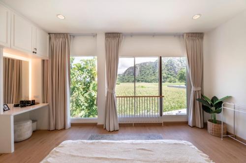 Ένα ή περισσότερα κρεβάτια σε δωμάτιο στο Private Courtyard Villa