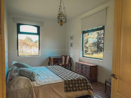 Ένα ή περισσότερα κρεβάτια σε δωμάτιο στο Casa de Campo San Agustín