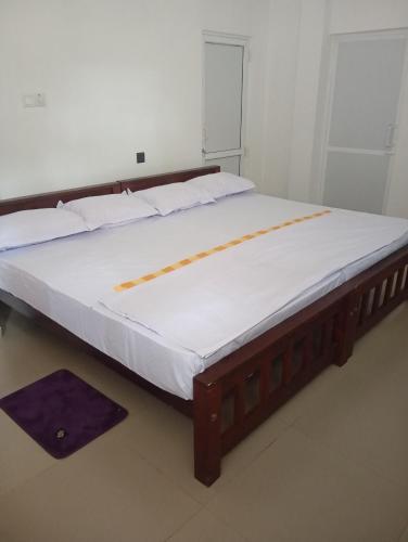 Postel nebo postele na pokoji v ubytování Swarnavilla Yala