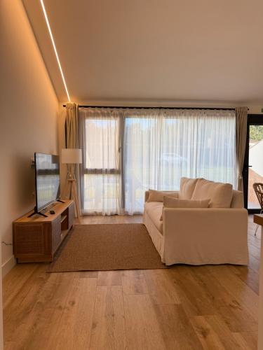 Ένα ή περισσότερα κρεβάτια σε δωμάτιο στο Apartamentos Campo Mingo