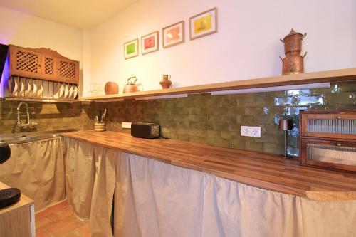 Kuchyň nebo kuchyňský kout v ubytování El Castañero Only Adults