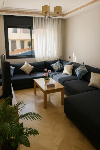 Istumisnurk majutusasutuses Appartement bord de mer avec piscine à Bouznika