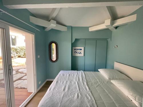 Postel nebo postele na pokoji v ubytování La Maison du Lac