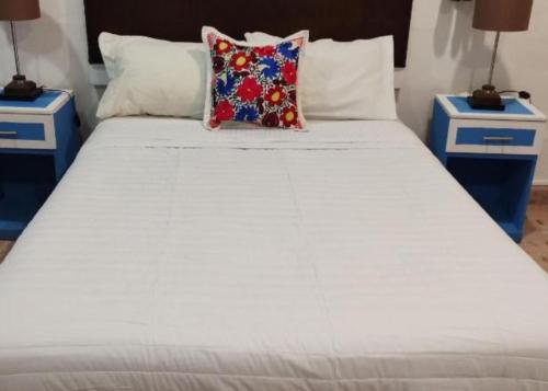 Postel nebo postele na pokoji v ubytování Habitacion2 con baño propio