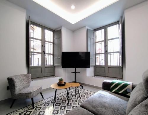 Et tv og/eller underholdning på Luxury Suite Casa Palacio Marina Verde