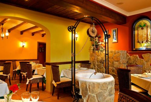 Restaurant ou autre lieu de restauration dans l'établissement Huerta de las Palomas
