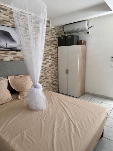 Ένα ή περισσότερα κρεβάτια σε δωμάτιο στο Le Confort Double