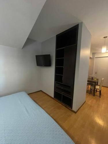 Voodi või voodid majutusasutuse Mono ambiente microcentro toas