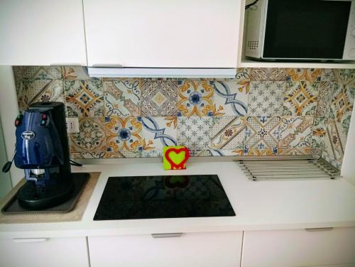 Een keuken of kitchenette bij PETER PAN apartment