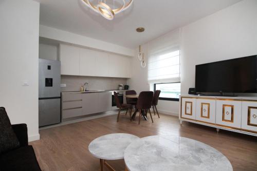 Η κουζίνα ή μικρή κουζίνα στο Aqua Lux Apartment BW