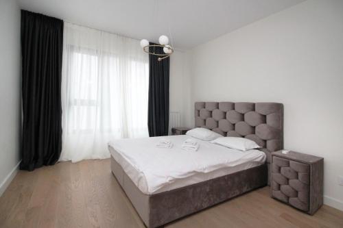 Ένα ή περισσότερα κρεβάτια σε δωμάτιο στο Aqua Lux Apartment BW