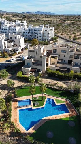 Der Swimmingpool an oder in der Nähe von Corvera Golf Lexu