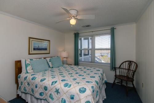 En eller flere senge i et værelse på Dreamcatcher