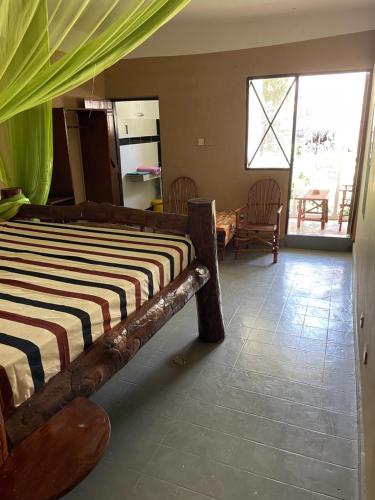 Ένα ή περισσότερα κρεβάτια σε δωμάτιο στο KenRock