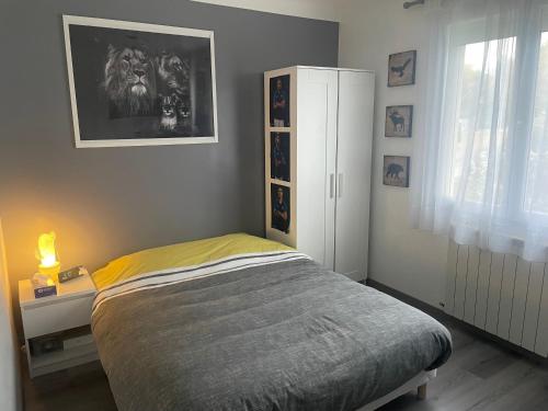 Postel nebo postele na pokoji v ubytování Maison avec piscine sécurisée au pied des Cévennes