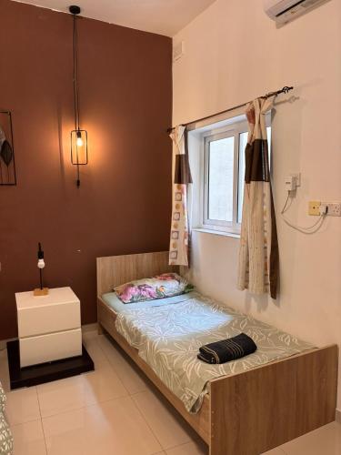Una cama o camas en una habitación de 4 Person Sliema Spacious Room Airconditioned and Self Check