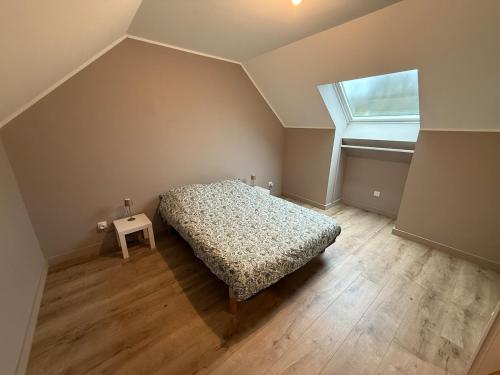 En eller flere senge i et værelse på Maison neuve proche Dole - Forêt de Chaux